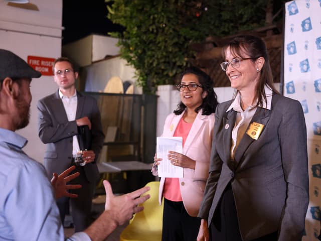 "Matt Beienburg, Priya Sundareshan & Lisa Fink" by Gage Skidmore / Flickr, CC BY-SA 2.0. Source: https://www.flickr.com/photos/gageskidmore/54504559745/ License: https://creativecommons.org/licenses/by-sa/2.0/ Flickr photo ID: 54504559745. Original file; no modifications.